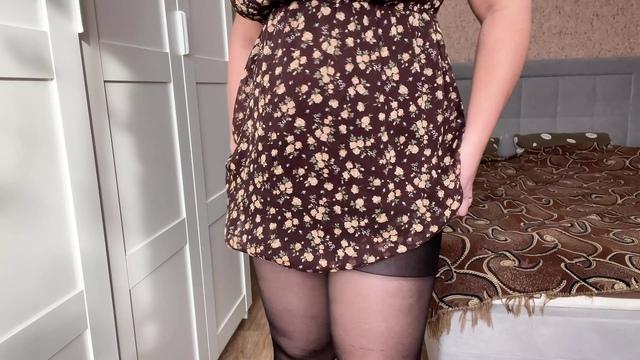 Beauty in sexy pantyhose poses and caresses her holes to orgasm