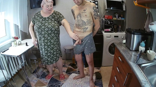 mother-in-law does a deep blowjob jerks off a dick to a cumshot